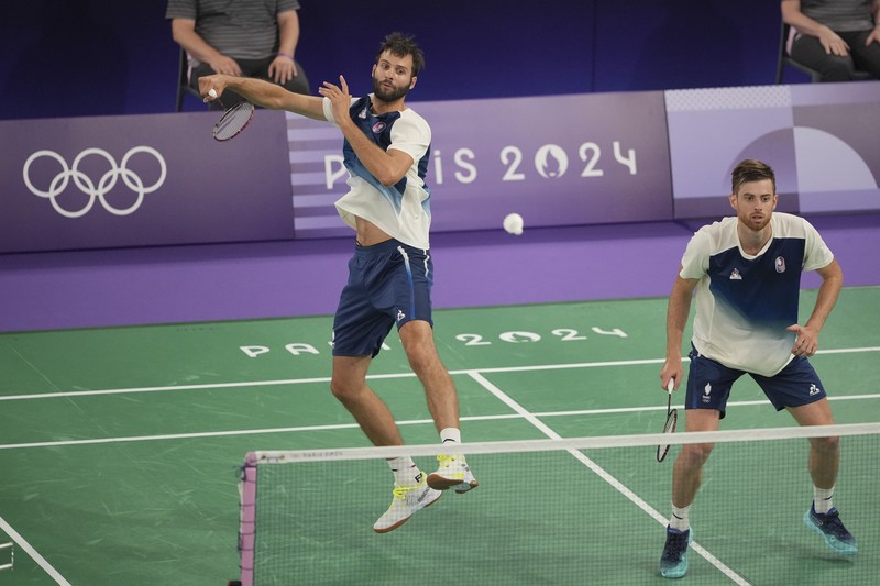 Fajar Alfian/Muhammad Rian Ardianto mengamankan tiket ke perempatfinal Olimpiade Paris 2024. Meski sempat terganggu oleh faktor teknis, Fajar/Rian tetap tenang dan fokus! Sebelum berlaga melawan wakil Prancis, Lucas Corvee/Ronan Labar pada Senin (29/7/2024). Fajar Alfian/Muhammad Rian Ardianto mengamankan tiket ke perempatfinal Olimpiade Paris 2024. Meski sempat terganggu oleh faktor teknis, Fajar/Rian tetap tenang dan fokus! Sebelum berlaga melawan wakil Prancis, Lucas Corvee/Ronan Labar pada Senin (29/7/2024). (Dok. PBSI)