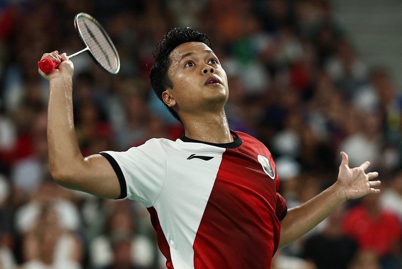 Anthony Sinisuka Ginting dari Indonesia bertanding melawan Tomo Junior Popov dari Prancis selama pertandingan penyisihan grup bulu tangkis tunggal putra selama Olimpiade Musim Panas 2024, di Porte de la Chapelle Arena, Rabu, 31 Juli 2024, di Paris, Prancis. Anthony Sinisuka Ginting dari Indonesia bertanding melawan Tomo Junior Popov dari Prancis selama pertandingan penyisihan grup bulu tangkis tunggal putra selama Olimpiade Musim Panas 2024, di Porte de la Chapelle Arena, Rabu, 31 Juli 2024, di Paris, Prancis. (AP Photo/Dita Alangkara)