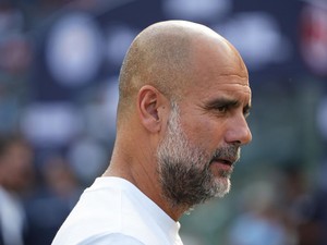 Tinju Amukan Pep Guardiola