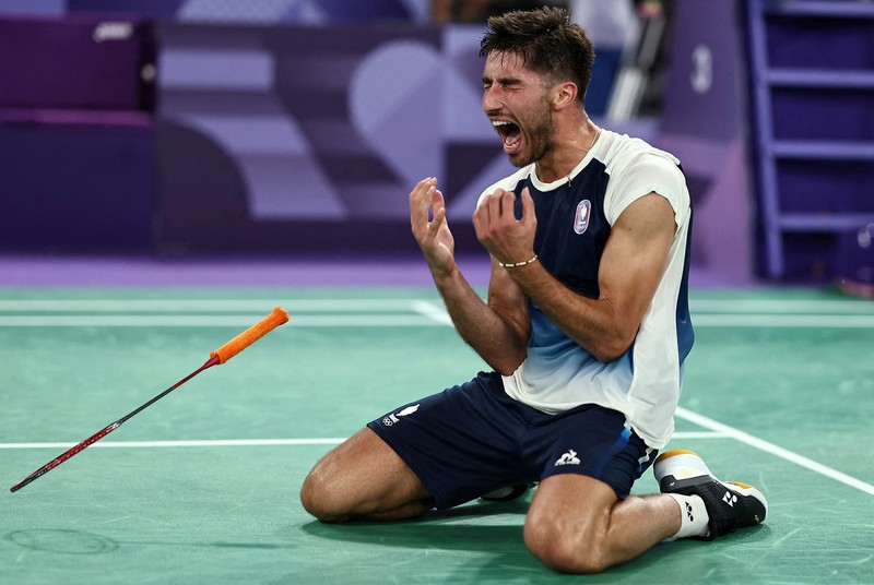 Anthony Sinisuka Ginting dari Indonesia bertanding melawan Tomo Junior Popov dari Prancis selama pertandingan penyisihan grup bulu tangkis tunggal putra selama Olimpiade Musim Panas 2024, di Porte de la Chapelle Arena, Rabu, 31 Juli 2024, di Paris, Prancis. Anthony Sinisuka Ginting dari Indonesia bertanding melawan Tomo Junior Popov dari Prancis selama pertandingan penyisihan grup bulu tangkis tunggal putra selama Olimpiade Musim Panas 2024, di Porte de la Chapelle Arena, Rabu, 31 Juli 2024, di Paris, Prancis. (AP Photo/Dita Alangkara)