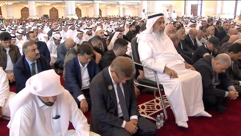 People attend the funeral of assassinated Hamas chief Ismail Haniyeh at Imam Muhammad ibn Abd al-Wahhab Mosque, on the day of his burial, in Doha, Qatar, August 2, 2024, in this screengrab taken from video. Qatar TV via REUTERS THIS IMAGE HAS BEEN SUPPLIED BY A THIRD PARTY