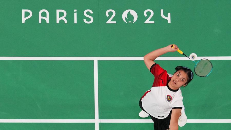 Aksi badminton dari Indonesia Gregoria Mariska Tunjung beraksi saat bertanding melawan Ratchanok Intanon dari Thailand. REUTERS/Hamad I Mohammed