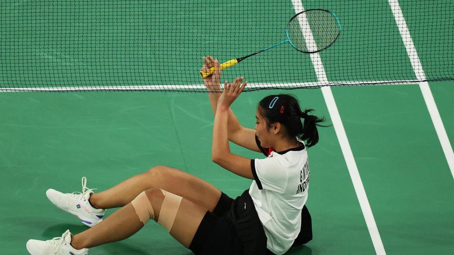 Aksi badminton dari Indonesia Gregoria Mariska Tunjung beraksi saat bertanding melawan Ratchanok Intanon dari Thailand. REUTERS/Hamad I Mohammed