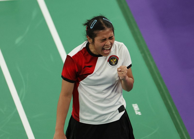 OLYMPICS-2024-BADMINTON/ Aksi badminton dari Indonesia Gregoria Mariska Tunjung beraksi saat bertanding melawan Ratchanok Intanon dari Thailand. REUTERS/Hamad I Mohammed