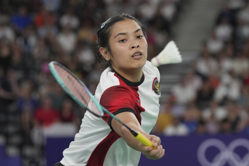 Aksi badminton dari Indonesia Gregoria Mariska Tunjung beraksi saat bertanding melawan Ratchanok Intanon dari Thailand. REUTERS/Hamad I Mohammed
