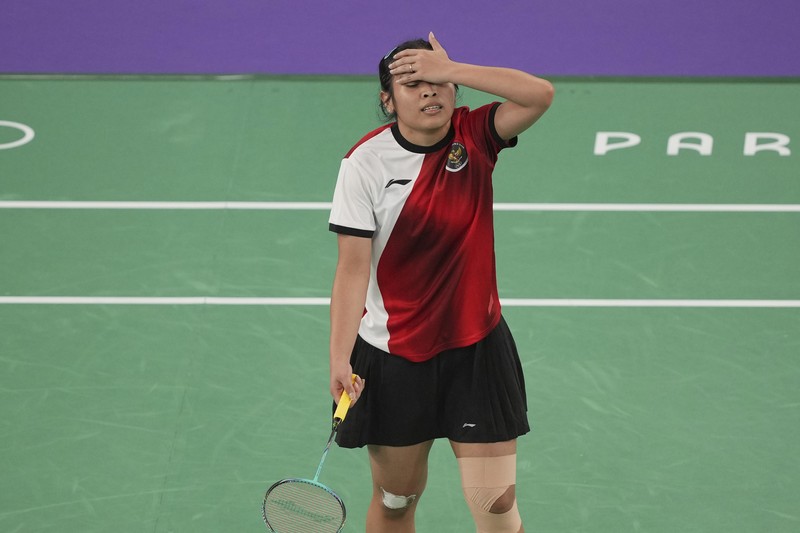 Gregoria Mariska Tunjung dari Indonesia bereaksi saat bermain melawan An Se-young dari Korea Selatan selama pertandingan semifinal bulu tangkis tunggal putri di Olimpiade Musim Panas 2024, Minggu, 4 Agustus 2024, di Paris, Prancis. Gregoria Mariska Tunjung dari Indonesia bereaksi saat bermain melawan An Se-young dari Korea Selatan selama pertandingan semifinal bulu tangkis tunggal putri di Olimpiade Musim Panas 2024, Minggu, 4 Agustus 2024, di Paris, Prancis. (AP Photo/Kin Cheung)