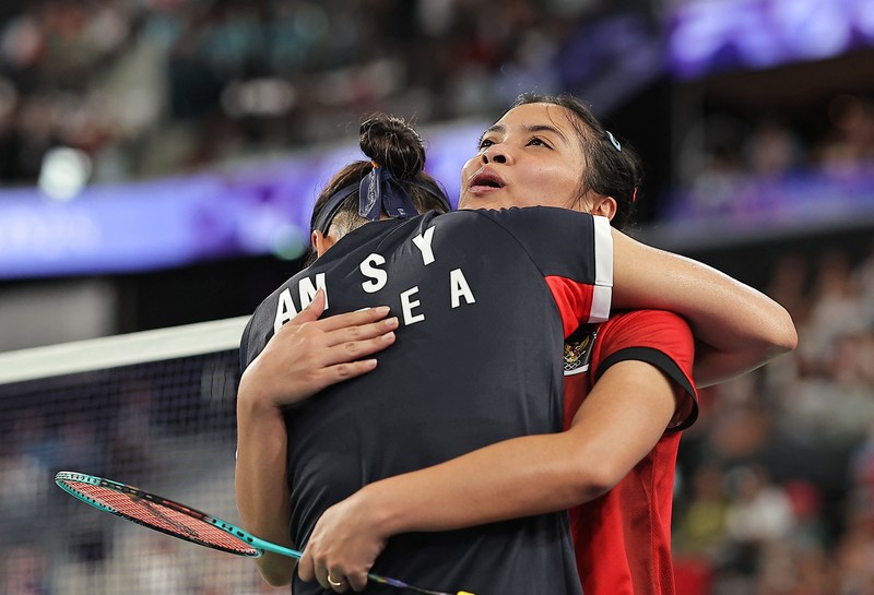 Gregoria Mariska Tunjung dari Indonesia bereaksi saat bermain melawan An Se-young dari Korea Selatan selama pertandingan semifinal bulu tangkis tunggal putri di Olimpiade Musim Panas 2024, Minggu, 4 Agustus 2024, di Paris, Prancis. Gregoria Mariska Tunjung dari Indonesia bereaksi saat bermain melawan An Se-young dari Korea Selatan selama pertandingan semifinal bulu tangkis tunggal putri di Olimpiade Musim Panas 2024, Minggu, 4 Agustus 2024, di Paris, Prancis. (AP Photo/Kin Cheung)