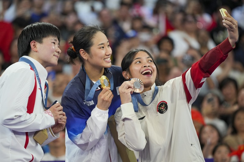 Aksi pebulu tangkis tunggal putri Indonesia, Gregoria Mariska Tunjung saat menghadapi pebulu tangkis Korea Selatan, An Se-young pada pertandingan semifinal Olimpiade Musim Panas 2024, Minggu, 4 Agustus 2024, di Paris, Prancis. (AP Photo/Kin Cheung) Aksi pebulu tangkis tunggal putri Indonesia, Gregoria Mariska Tunjung saat menghadapi pebulu tangkis Korea Selatan, An Se-young pada pertandingan semifinal Olimpiade Musim Panas 2024, Minggu, 4 Agustus 2024, di Paris, Prancis. (AP Photo/Kin Cheung)