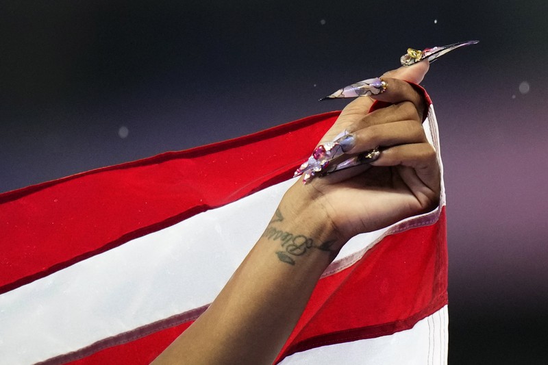 Sha'carri Richardson dari Amerika Serikat, memenangkan babak penyisihan lari 100 meter putri di Olimpiade Musim Panas 2024, Jumat, 2 Agustus 2024, di Saint-Denis, Prancis. Sha'carri Richardson dari Amerika Serikat, memenangkan babak penyisihan lari 100 meter putri di Olimpiade Musim Panas 2024, Jumat, 2 Agustus 2024, di Saint-Denis, Prancis. (AP Photo/Petr David Josek)