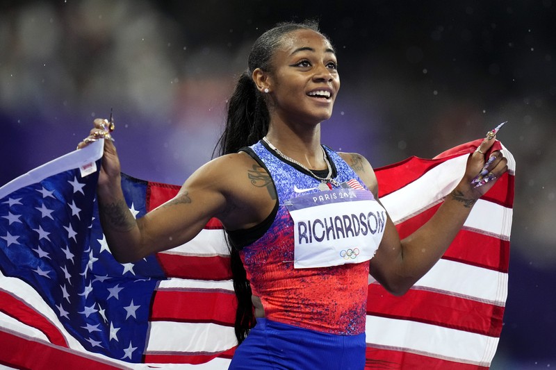 Sha'carri Richardson dari Amerika Serikat, memenangkan babak penyisihan lari 100 meter putri di Olimpiade Musim Panas 2024, Jumat, 2 Agustus 2024, di Saint-Denis, Prancis. Sha'carri Richardson dari Amerika Serikat, memenangkan babak penyisihan lari 100 meter putri di Olimpiade Musim Panas 2024, Jumat, 2 Agustus 2024, di Saint-Denis, Prancis. (AP Photo/Petr David Josek)