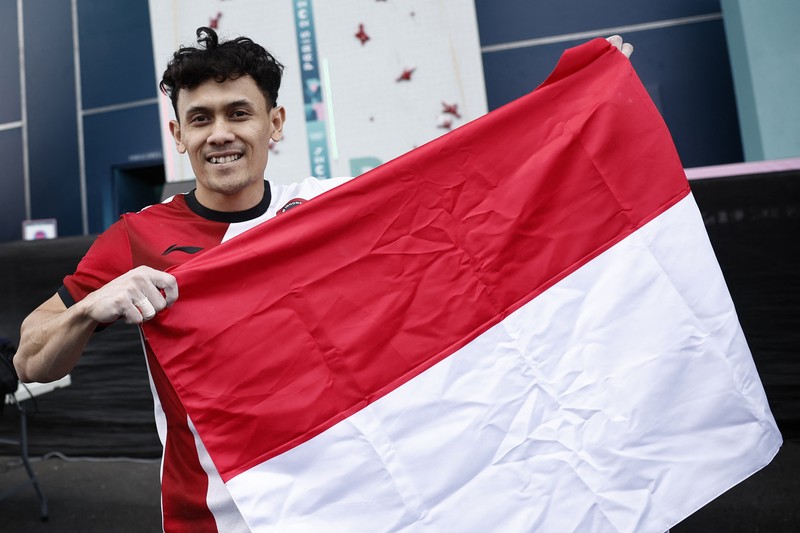 Peraih medali emas Veddriq Leonardo dari Indonesia, peraih medali perak Peng Wu dari Tiongkok dan peraih medali perunggu Sam Watson dari Amerika Serikat berpose dengan medali. Peraih medali emas Veddriq Leonardo dari Indonesia, peraih medali perak Peng Wu dari Tiongkok dan peraih medali perunggu Sam Watson dari Amerika Serikat berpose dengan medali. (REUTERS/Benoit Tessier)