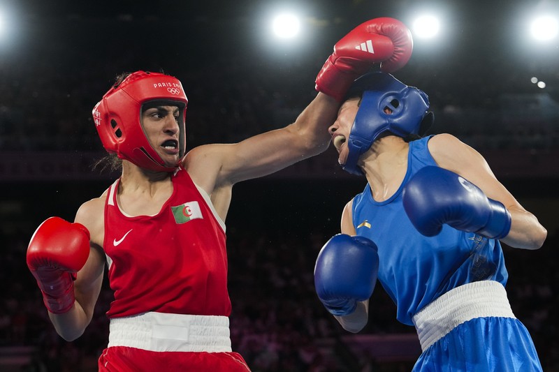 APTOPIX Paris Olympics Boxing Algeria's Imane Khelif, left, fights China's Yang Liu in their women's 66 kg final boxing match at the 2024 Summer Olympics, Friday, Aug. 9, 2024, in Paris, France. (AP Photo/Ariana Cubillos)