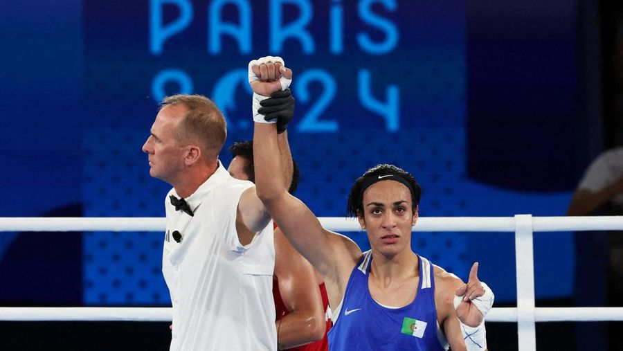 Algeria's Imane Khelif, left, fights China's Yang Liu in their women's 66 kg final boxing match at the 2024 Summer Olympics, Friday, Aug. 9, 2024, in Paris, France. (AP Photo/Ariana Cubillos)