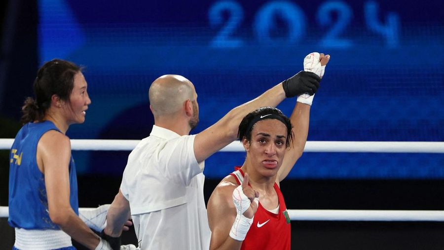 Algeria's Imane Khelif, left, fights China's Yang Liu in their women's 66 kg final boxing match at the 2024 Summer Olympics, Friday, Aug. 9, 2024, in Paris, France. (AP Photo/Ariana Cubillos)