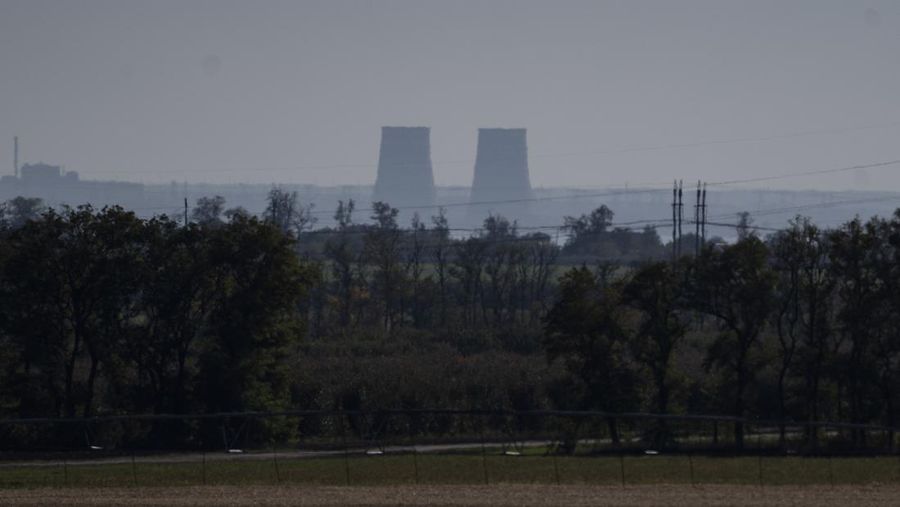 FILE - Zaporizhzhia nuclear power plant is seen from around twenty kilometers away in an area in the Dnipropetrovsk region, Ukraine, Monday, Oct. 17, 2022. A statement released Friday, May 26, 2023, by the intelligence directorate of Ukraine's Defense Ministry claimed that Russian forces would strike the Zaporizhzhia nuclear power plant, the biggest in Europe, and then report a radioactive leak in order to trigger an international probe that would pause the hostilities and give the Russian forces the respite they need to regroup ahead of the counteroffensive. (AP Photo/Leo Correa, File)