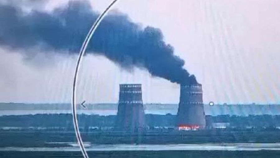 This video grab taken from a handout footage released by the Ukrainian Presidential Press Service on August 11, 2024, shows a fire at a cooling tower of the Russian-controlled Zaporizhzhia nuclear power plant in Energodar, Southern Ukraine. (Photo by Handout / UKRAINIAN PRESIDENTIAL PRESS SERVICE / AFP) / RESTRICTED TO EDITORIAL USE - MANDATORY CREDIT