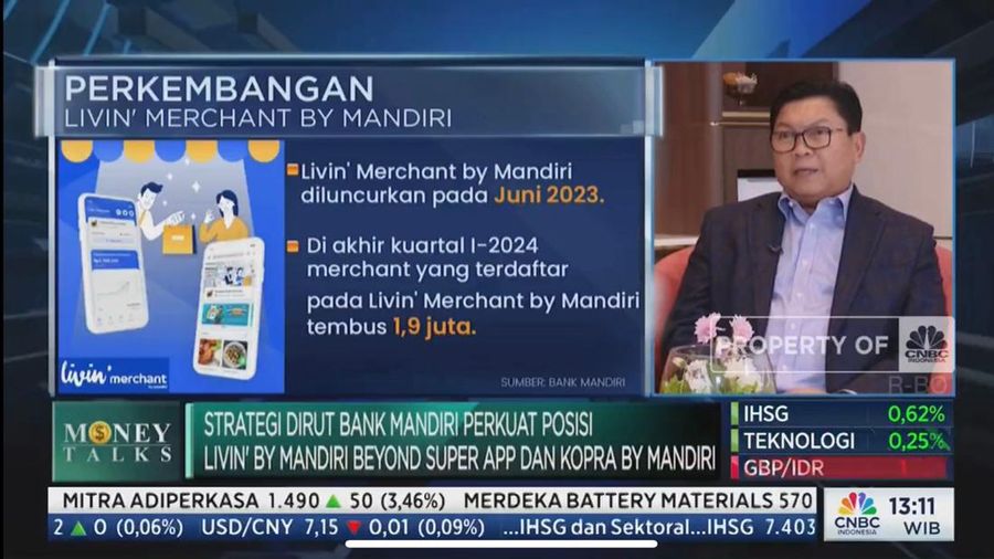 Direktur Utama Bank Mandiri, Darmawan Junaidi menjelaskan fitur merchant yang membantu transaksi UMKM.