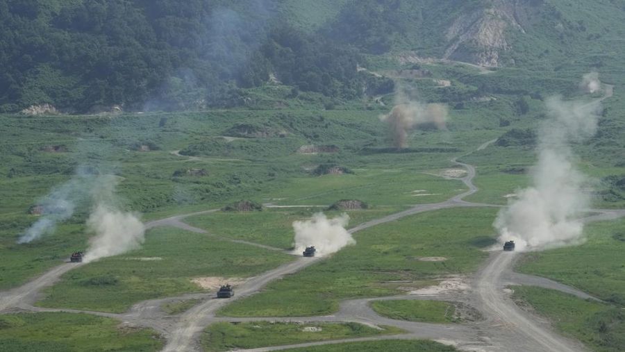 A U.S. M1A2 Abrams battle tank fires during a live-fire drill of U.S. Army's 1st Armored Brigade Combat Team, 1st Armored Division at the Rodriguez Live Fire Complex, in Pocheon, South Korea, August 14, 2024. REUTERS/Kim Soo-hyeon