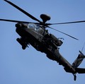 An AH-64 Apache helicopter flies during a live-fire drill of the U.S. Army's 1st Armored Brigade Combat Team, 1st Armored Division at the Rodriguez Live Fire Complex, in Pocheon, South Korea, August 14, 2024. REUTERS/Kim Soo-hyeon