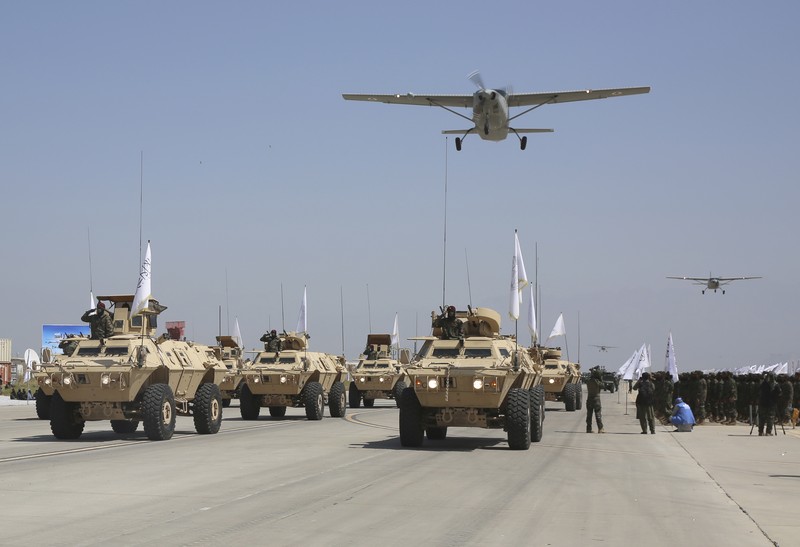 Taliban Afghanistan merayakan tiga tahun berkuasa pada Rabu (14/8/2024) dengan parade militer. (AP/Siddiqullah Alizai) Taliban Afghanistan merayakan tiga tahun berkuasa pada Rabu (14/8/2024) dengan parade militer. (AP/Siddiqullah Alizai)