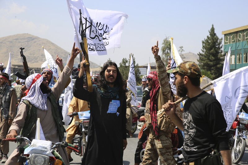 Taliban Afghanistan merayakan tiga tahun berkuasa pada Rabu (14/8/2024) dengan parade militer. (AP/Siddiqullah Alizai) Taliban Afghanistan merayakan tiga tahun berkuasa pada Rabu (14/8/2024) dengan parade militer. (AP/Siddiqullah Alizai)