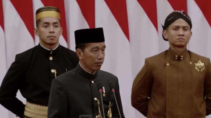 Presiden Joko Widodo saat memberikan pidato dalam Sidang Tahunan MPR dan Sidang Bersama DPR RI-DPD RI di gedung DPR/MPR RI, Jakarta, Jumat (16/8/2024). (Tangkapan Layar Youtube DPR RI)