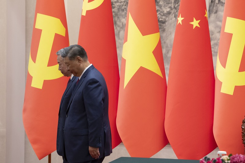 Presiden China, Xi Jinping dan Presiden Vietnam To Lam saat menggelar pertemuan di Balai Agung Rakyat di Beijing, Senin (19/8/2024). (Andres Martinez Casares/Pool Photo via AP) Presiden China, Xi Jinping dan Presiden Vietnam To Lam saat menggelar pertemuan di Balai Agung Rakyat di Beijing, Senin (19/8/2024). (Andres Martinez Casares/Pool Photo via AP)