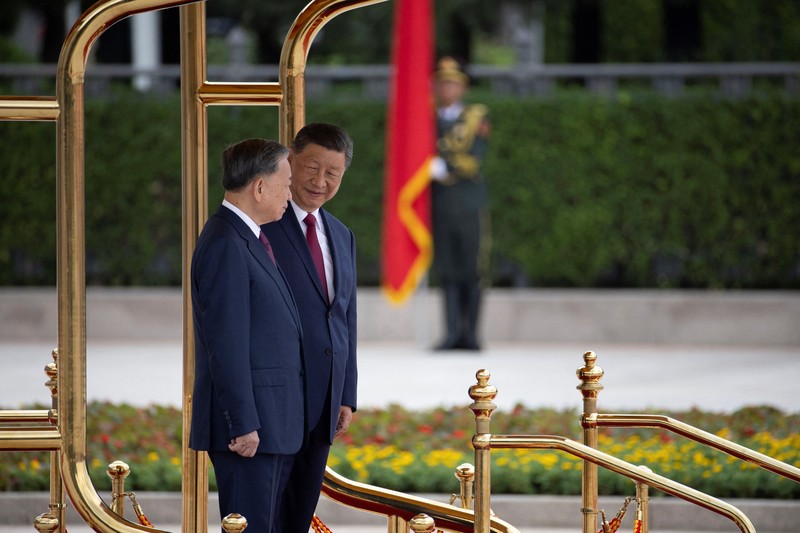 Presiden China, Xi Jinping dan Presiden Vietnam To Lam saat menggelar pertemuan di Balai Agung Rakyat di Beijing, Senin (19/8/2024). (Andres Martinez Casares/Pool Photo via AP) Presiden China, Xi Jinping dan Presiden Vietnam To Lam saat menggelar pertemuan di Balai Agung Rakyat di Beijing, Senin (19/8/2024). (Andres Martinez Casares/Pool Photo via AP)