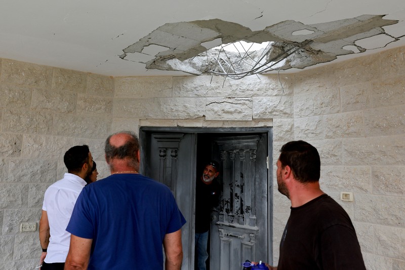 Sayap bersenjata Hamas Brigade Al Qassam mengklaim telah menembakkan roket M90 ke Ibu Kota Tel Aviv, Israel, pada Minggu (25/8) malam. (REUTERS/Ammar Awad) Sayap bersenjata Hamas Brigade Al Qassam mengklaim telah menembakkan roket M90 ke Ibu Kota Tel Aviv, Israel, pada Minggu (25/8) malam. (REUTERS/Ammar Awad)