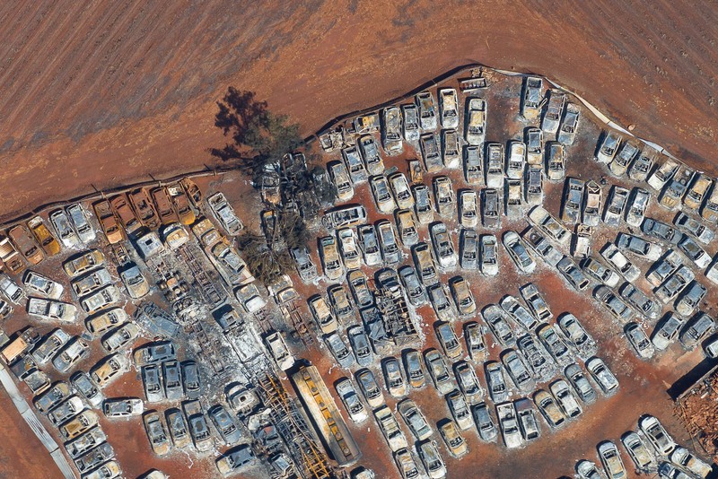 Pemandangan dari drone menunjukkan mobil-mobil yang terbakar di gudang kendaraan yang disita oleh polisi di kota Dumont, negara bagian Sao Paulo, Brasil, Senin (26/8/2024). (REUTERS/JOEL SILVA) Pemandangan dari drone menunjukkan mobil-mobil yang terbakar di gudang kendaraan yang disita oleh polisi di kota Dumont, negara bagian Sao Paulo, Brasil, Senin (26/8/2024). (REUTERS/JOEL SILVA)