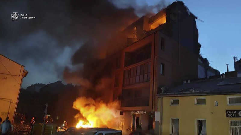 In this photo provided by the State Emergency Service of Ukraine, a residential building burns after a Russian strike in Lviv, Ukraine, Wednesday, Sept. 4, 2024. (State Emergency Service of Ukraine via AP)