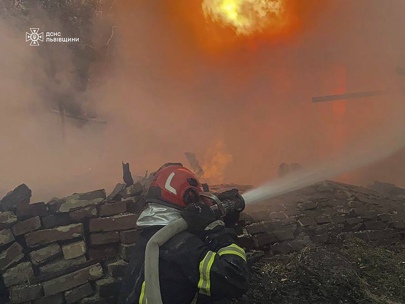 Russia Ukraine War In this photo provided by the State Emergency Service of Ukraine, a residential building burns after a Russian strike in Lviv, Ukraine, Wednesday, Sept. 4, 2024. (State Emergency Service of Ukraine via AP)
