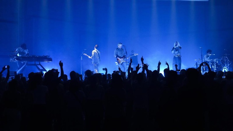 Emily Armstrong, from left, Phoenix, and Alex Feder (filling in for guitarist Brad Delson) of Linkin Park perform Thursday, Sept. 5, 2024, in Los Angeles. It was announced on Thursday that Dead Sara's Emily Armstrong would join as the band's new co-singer and songwriter/producer Colin Brittain would join on drums. Linkin Park will release the album 