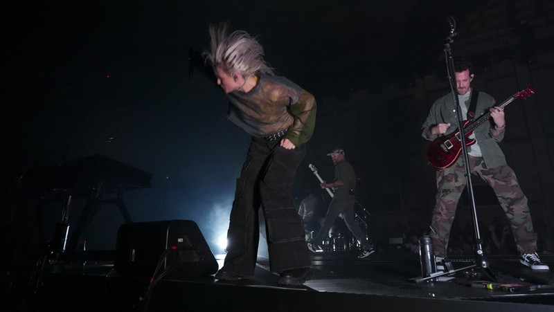 Emily Armstrong, from left, Phoenix, and Alex Feder (filling in for guitarist Brad Delson) of Linkin Park perform Thursday, Sept. 5, 2024, in Los Angeles. It was announced on Thursday that Dead Sara's Emily Armstrong would join as the band's new co-singer and songwriter/producer Colin Brittain would join on drums. Linkin Park will release the album 