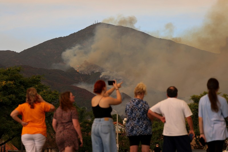 ebaran yang melanda perbukitan Trabuco di Orange County, California, Amerika Serikat (AS), Senin (9/9/2024). (REUTERS/Mike Blake) ebaran yang melanda perbukitan Trabuco di Orange County, California, Amerika Serikat (AS), Senin (9/9/2024). (REUTERS/Mike Blake)
