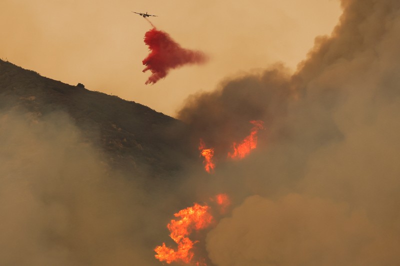 Kebakaran Bandara terjadi di Orange dan Riverside Counties, dalam tangkapan layar yang diambil dari video yang direkam dari Santiago Peak, California, AS, 10 September 2024. Kebakaran Bandara terjadi di Orange dan Riverside Counties, dalam tangkapan layar yang diambil dari video yang direkam dari Santiago Peak, California, AS, 10 September 2024. (ALERTCALIFORNIA | UC SAN DIEGO/Handout via REUTERS)