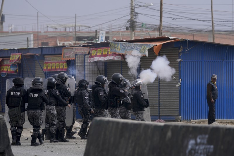 Bolivia Morales March A supporter of former President Evo Morales clashes with supporters of current President Luis Arce in El Alto, Bolivia, Sunday, Sept. 22, 2024. (AP Photo/Juan Karita)