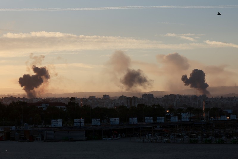 ISRAEL-PALESTINIANS/LEBANON Smoke billows over southern Lebanon following Israeli strikes, amid ongoing cross-border hostilities between Hezbollah and Israeli forces, as seen from Tyre, southern Lebanon September 23, 2024. REUTERS/Aziz Taher