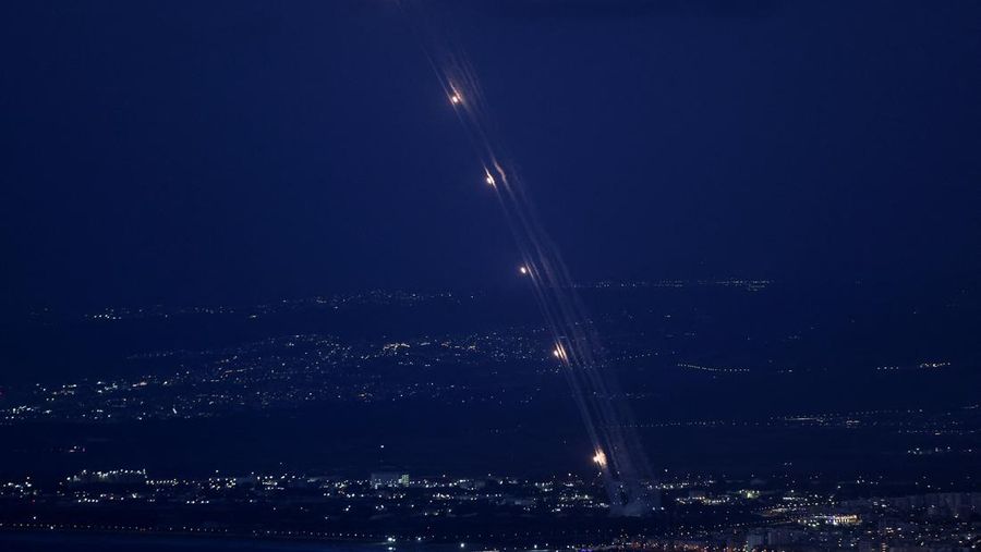 ISRAEL-PALESTINIANS/LEBANON Israel's Iron Dome anti-missile system operates for interceptions as rockets are launched from Lebanon towards Israel, amid cross-border hostilities between Hezbollah and Israel, as seen from Haifa, Israel, September 23, 2024. REUTERS/Ronen Zvulun