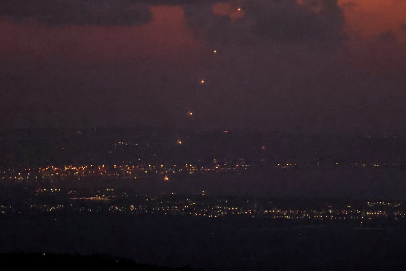 Israel’s Iron Dome missile defense system intercepts rockets fired from Lebanon, amid cross-border hostilities between Hezbollah and Israel, as seen from northern Israel, September 23, 2024. REUTERS/Jim Urquhart