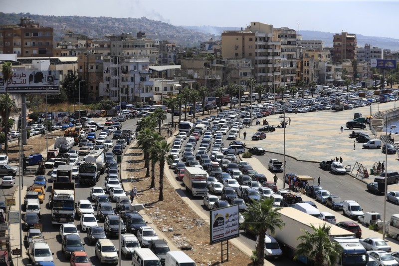 Mobil-mobil terjebak di tengah kemacetan saat mereka melarikan diri dari desa-desa selatan di tengah serangan udara Israel yang sedang berlangsung, di Sidon, Lebanon, Senin, 23 September 2024. Mobil-mobil terjebak di tengah kemacetan saat mereka melarikan diri dari desa-desa selatan di tengah serangan udara Israel yang sedang berlangsung, di Sidon, Lebanon, Senin, 23 September 2024. (AP Photo/Mohammed Zaatari)