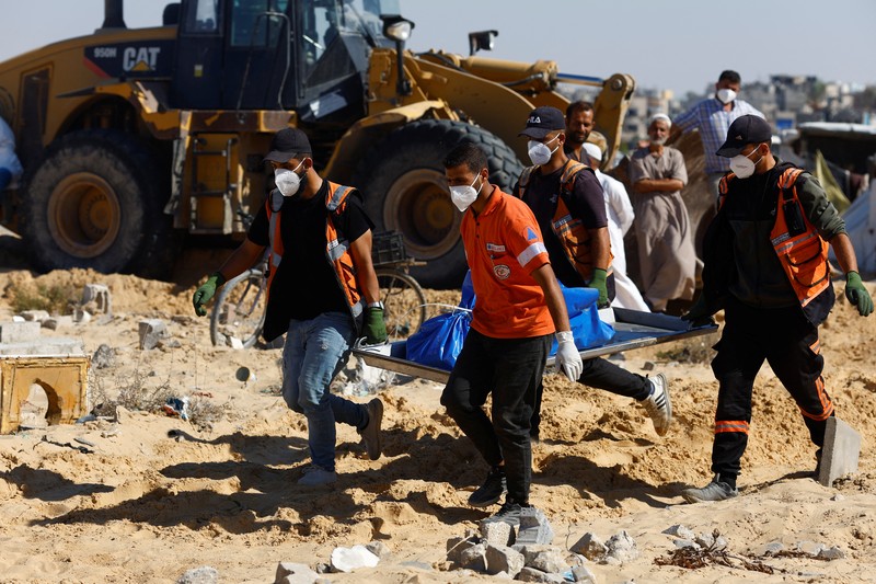Pasukan militer Israel mengirim sebuah truk kontainer berisi 88 mayat yang sudah membusuk ke Rumah Sakit di Jalur Gaza, Palestina. (AP/Abdel Kareem Hana) Pasukan militer Israel mengirim sebuah truk kontainer berisi 88 mayat yang sudah membusuk ke Rumah Sakit di Jalur Gaza, Palestina. (AP/Abdel Kareem Hana)