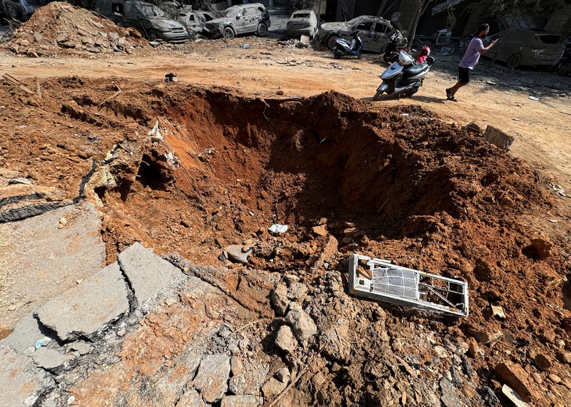 ISRAEL-PALESTINIANS/LEBANON A view shows a damaged building at the site of the Israeli air strike that killed Lebanon's Hezbollah leader Sayyed Hassan Nasrallah on Friday, in Beirut's southern suburbs, Lebanon, September 29, 2024. REUTERS/Ahmad Al-Kerdi