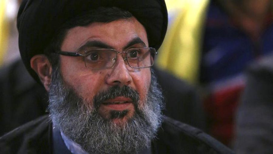 In this May 20, 2016 photo, Senior Hezbollah leader Hashem Safieddine, attends a ceremony marking the death of Hezbollah commander Mustafa Badreddine who was killed in an explosion in Damascus, in the southern suburb of Beirut, Lebanon. Safieddine who has been added to the first joint US and Saudi terrorism sanctions list ahead of Trump's visit, spoke on Sunday during an inauguration of a party venue. (AP Photo/Hussein Malla)