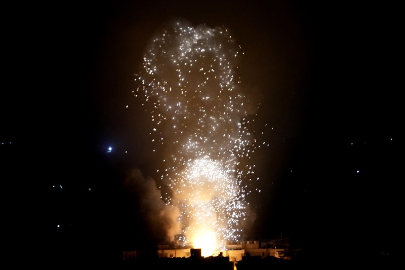 Lebanon Israel Flames and smoke rise from an Israeli airstrike in Dahiyeh, Beirut, Lebanon, early Sunday, Oct. 6, 2024. (AP Photo/Hussein Malla)