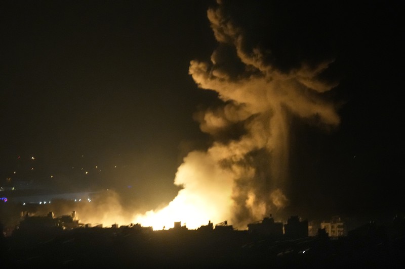 Flames and smoke rise from an Israeli airstrike in Dahiyeh, Beirut, Lebanon, early Sunday, Oct. 6, 2024. (AP Photo/Hussein Malla)