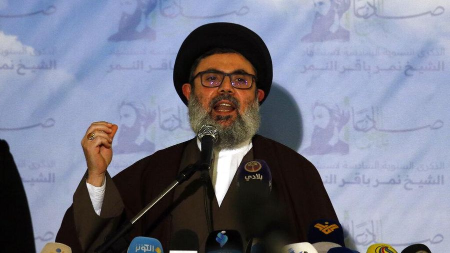 Senior Hezbollah leader Hashem Safieddine speaks during a conference for Saudi opposition in the southern Beirut suburb of Dahiyeh, Lebanon, Wednesday, Jan. 12, 2022. Lebanon's powerful Hezbollah group hosted a conference for Saudi opposition figures in its stronghold south of Beirut Wednesday in a defiant gesture certain to anger the oil-rich kingdom. (AP Photo/Bilal Hussein)