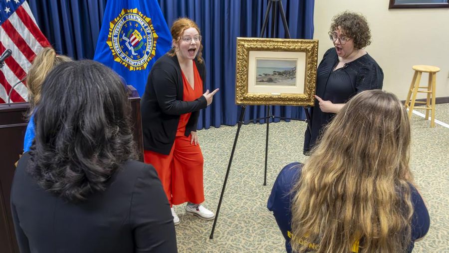 Francoise Parlagi, center, and Helen Lowe, far left, descendants of the original owners the Claude Monet painting entitled 