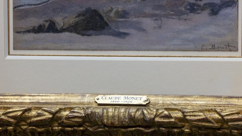 Francoise Parlagi, center, and Helen Lowe, far left, descendants of the original owners the Claude Monet painting entitled 