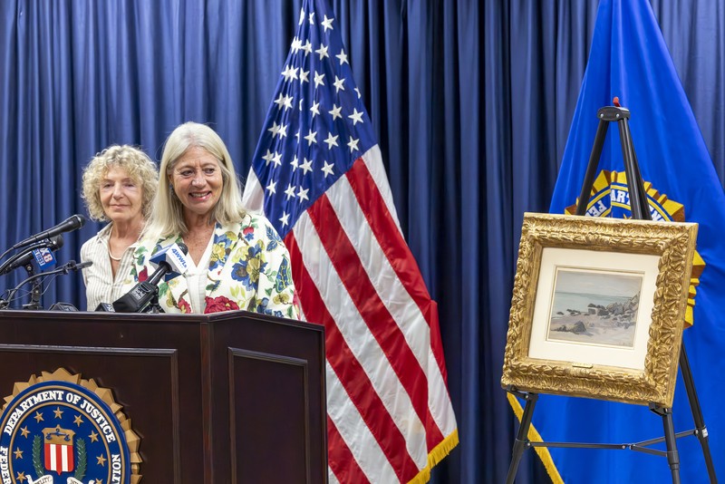 Francoise Parlagi, center, and Helen Lowe, far left, descendants of the original owners the Claude Monet painting entitled 